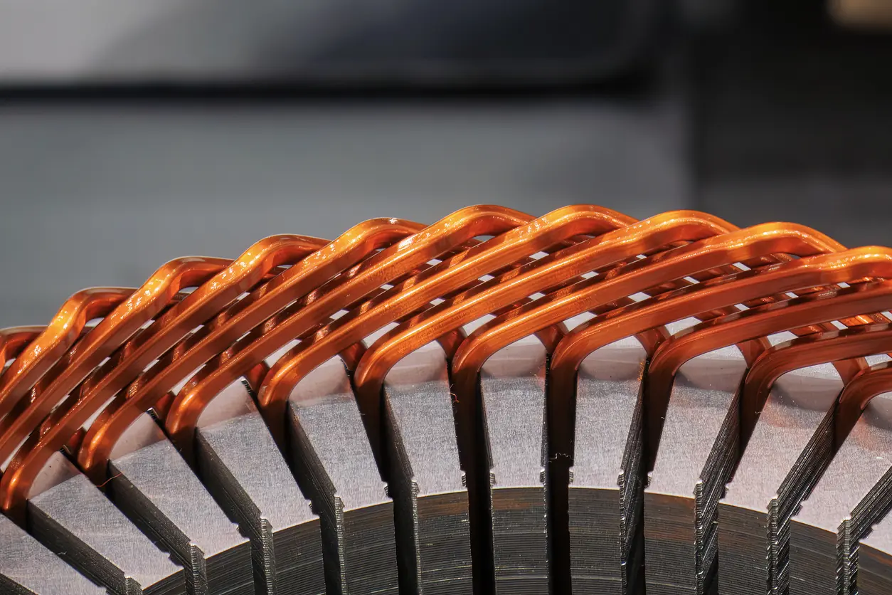 Bonded stator core lamination aiming for low core loss, higher performance
