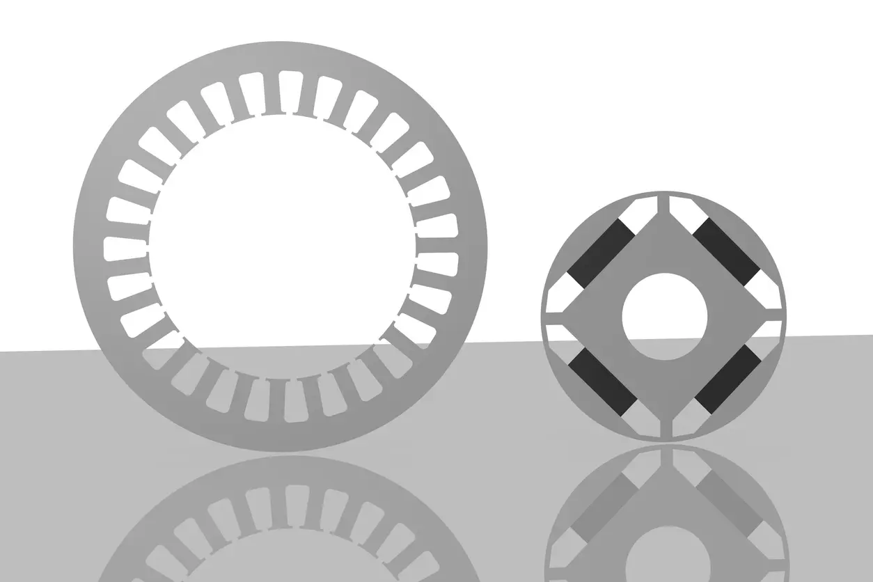 Electric motor stator lamination and an interior permanent magnet rotor lamination with four embedded magnets held by thin steel rotor bridges